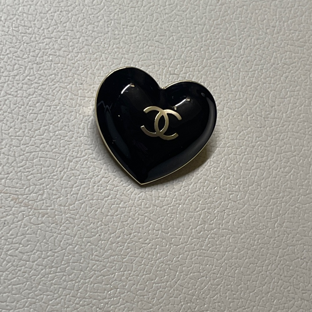 Authentic Chanel heart shape black charm